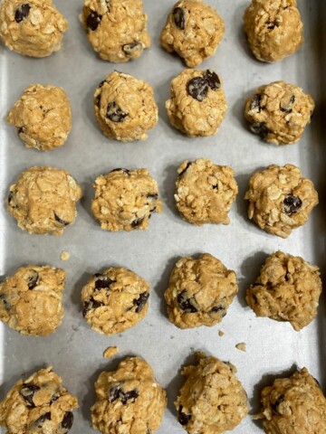 photo of a pan of chocolate chip protein balls with Rice Krispies