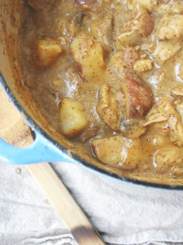 Dutch Oven Smothered Chicken and Potatoes Recipe
