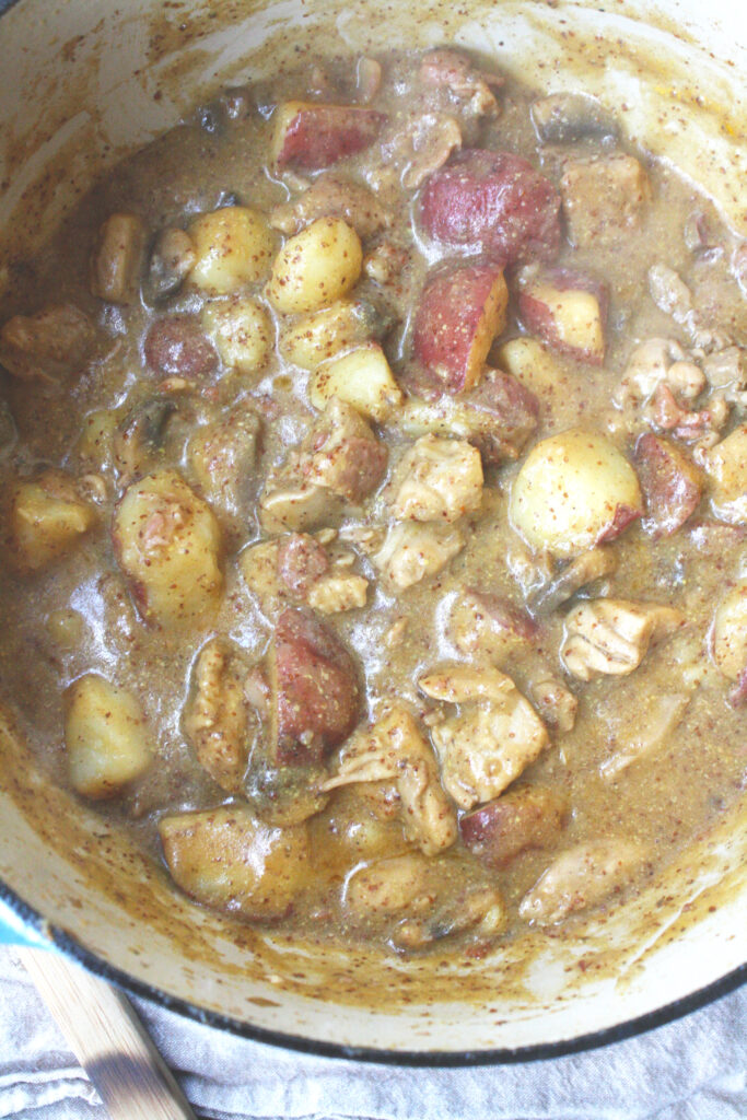 Dutch Oven Smothered Chicken and Potatoes for an Easy Weeknight Dinner - Aimee  Burmester