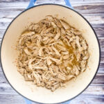 Photo of dutch oven pulled chicken