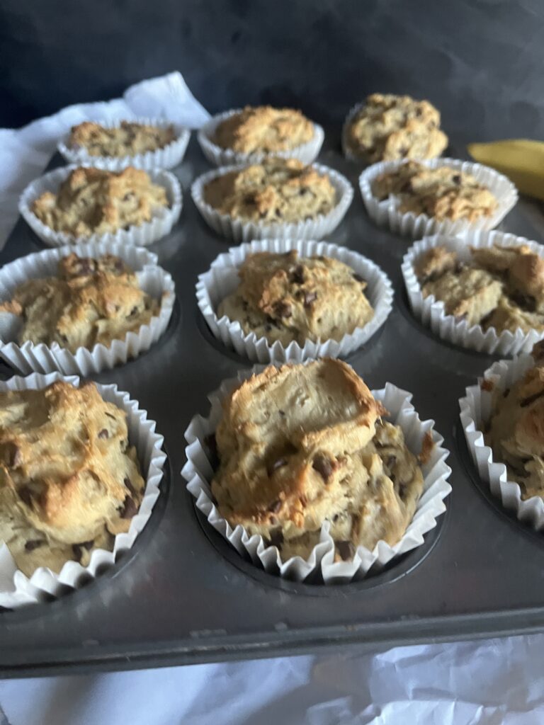 Photo of gluten-free banana chocolate chip muffins in muffin tin