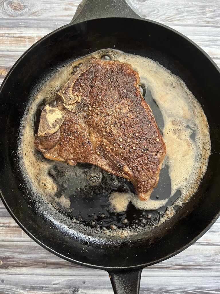 Photo of steak in a cast iron skillet
