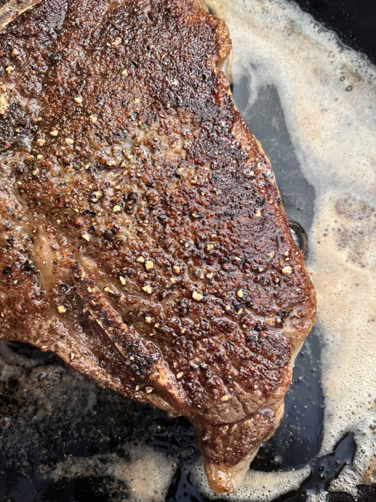 Photo of Steak in Cast Iron Skillet