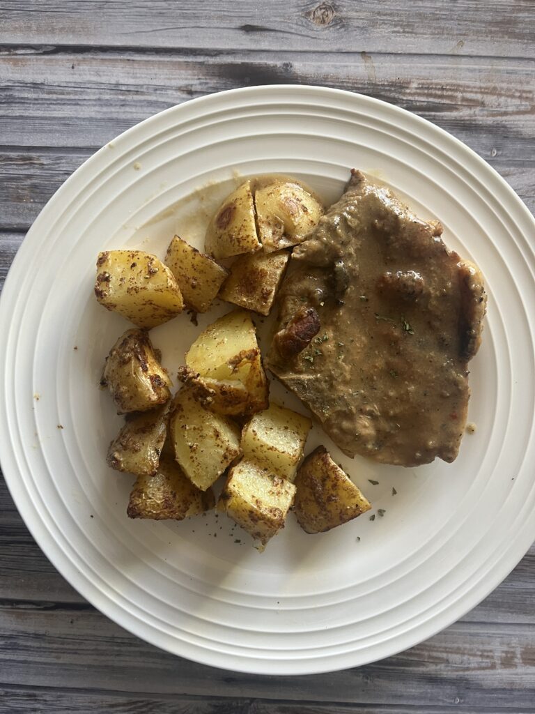 Photo of mustard roasted potato and porkchop