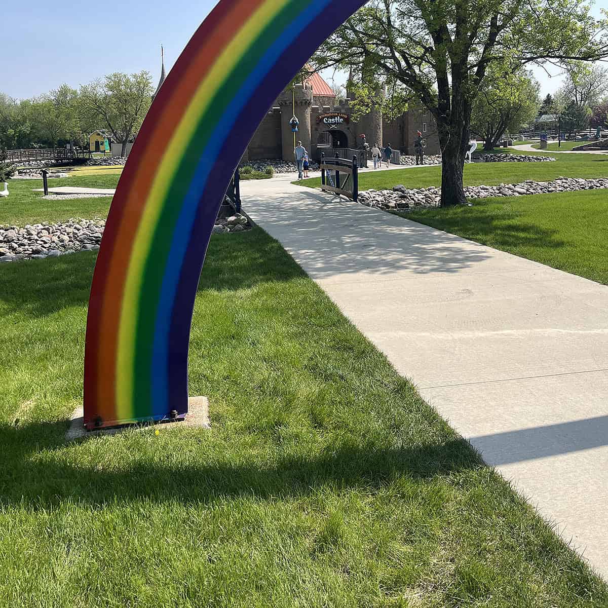 Photo of rainbow arch in front of castle at StoryBook Land in Aberdeen SD